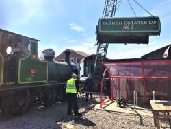 No.3 in the yard, with the saddle tank lifted away by a rail-mounted crane. 