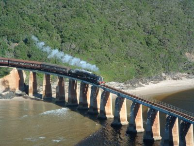 South African steam train crosses a wide river