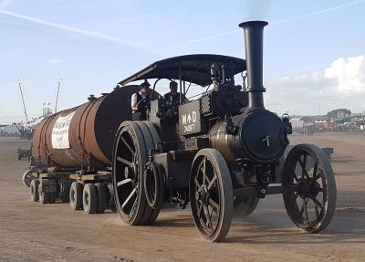 1912 McLaren 10nhp road locomotive 'Gigantic', in 1914 War Department livery at the 50th Great Dorset Steam Fair – 25th August 2018 (P Jewell) Steam road locomotive hauling a boiler on a trailer