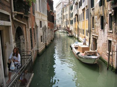 Narrow canal between Venetian buildings