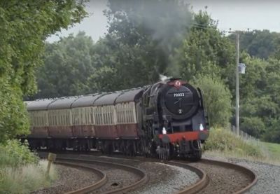 BR Standard Pacific Class 7 70022 'Tornado' (actually 70000 'Britannia') hauling the English Riviera Express from Bristol to Kingswear, first rail-tour since steam returned to the main line after Covid 19 lockdown. -- Sunday, 2nd August 2020 -- Derek Spicer (screen-grab from YouTube by SWRS Webmaster) view of the ocean over the deck of a container ship