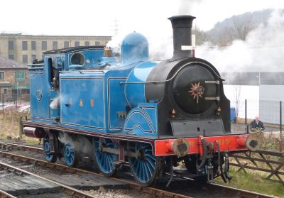 bright blue vintage steam locomotive
