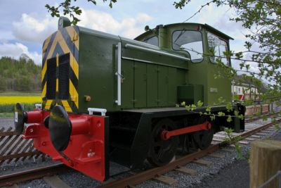 A beautifully restored industrial 0-4-0 diesel shunting locomotive.