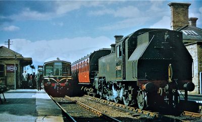 Happier days at Buckingham with a steam service from Bletchley interchanging with one of the single coach DMUs working to/from Banbury in 1961. (Photo provided by Dick Crane) A provincial town station in the Home Counties in 1961. A steam-hauled suburban service has arrived behind a large tank locomotive, whilst on the other platform an almost new, very early, diesel railcar waits for onward passengers.