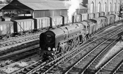 Britannia Class 4-6-2 on a freight train of vans at Southampton