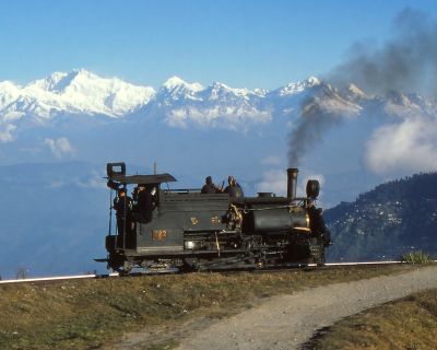 Loco 792 at the Batasia Loop on the Darjeeling Himalayan Mountain Railway in 1978 – Laurie Marshall Steam locomotive with Himalayas in background
