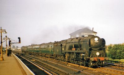 Rebuilt Merchant Navy steam locomotive on a passenger train