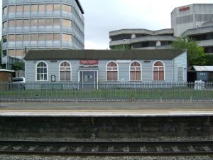 'The Manor', Slough railway station, May 2007 The single-storey, Victorian, wooden building known as 'The Manor' facing Platform One of Slough railway station, with the two unusually-shaped office blocks behind.